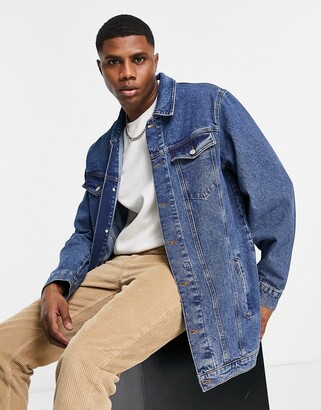ASOS DESIGN 70's longline denim jacket in mid wash blue - ShopStyle