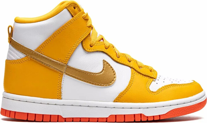 university gold sneakers