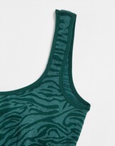 Thumbnail for your product : South Beach seamless light support sports bra in green animal print