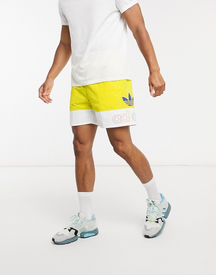adidas Pride shorts in yellow - ShopStyle