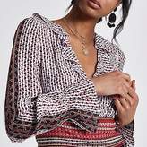 Thumbnail for your product : River Island Red mixed print wrap crop top