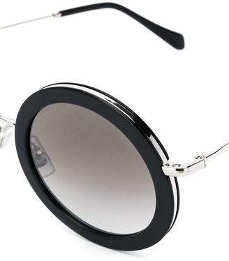 Miu Miu Eyewear Delice round frame sunglasses