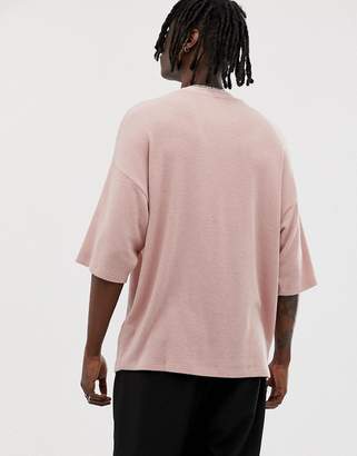 ASOS Design DESIGN oversized longline waffle t-shirt with half sleeve in pink