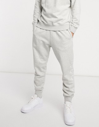 Nike swoosh cuffed joggers in grey clearance