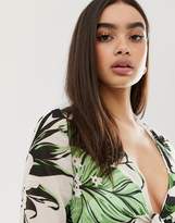 Thumbnail for your product : PrettyLittleThing exclusive tie front palm print crop top