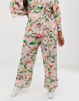 Thumbnail for your product : Liquorish Curve Liquorish Plus wide leg trousers in floral print with green piping co ord