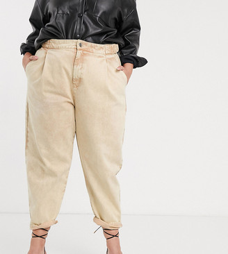 ASOS DESIGN Curve tapered boyfriend jeans with d-ring waist detail with curved seams in washed lemon