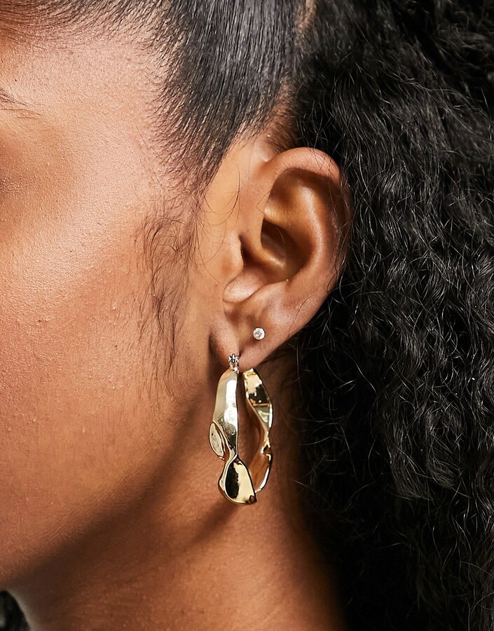 Topshop molten twist hoop earrings in gold - ShopStyle