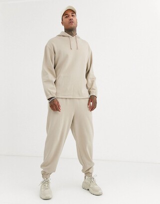 ASOS DESIGN tracksuit with oversized hoodie & oversized joggers in beige -  BEIGE - ShopStyle
