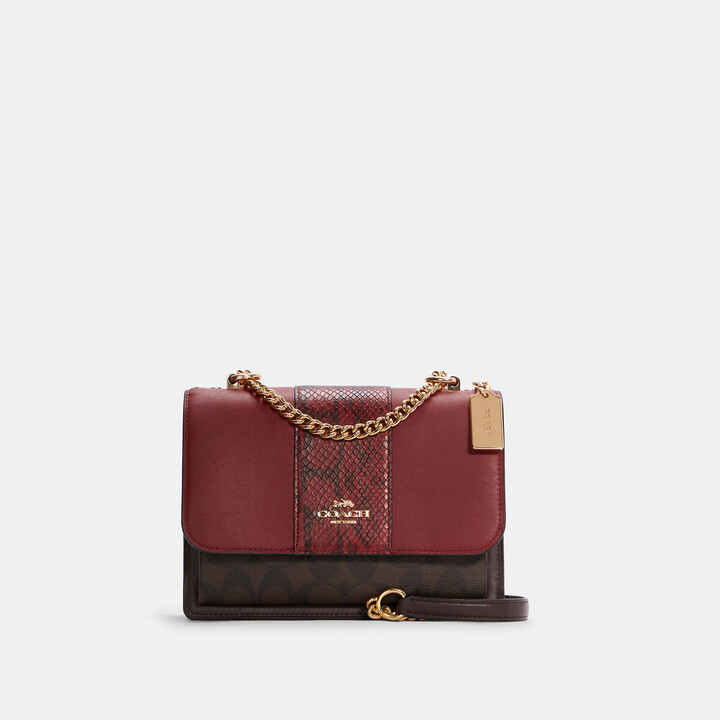 georgie saddle bolsa in colorblock signature canvas with rivets