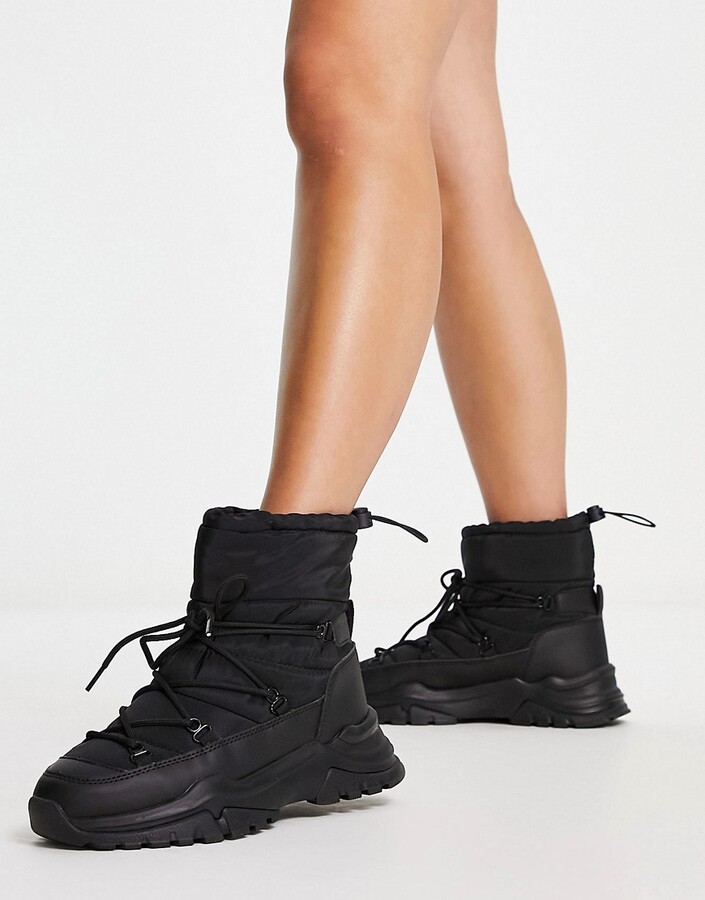 ASOS DESIGN Arctic lace up snow boots in black - ShopStyle