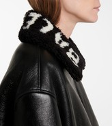 Thumbnail for your product : Balenciaga Logo shearling and leather jacket