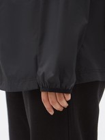 Thumbnail for your product : The Upside Serena Logo-print Hooded Windbreaker Jacket - Black
