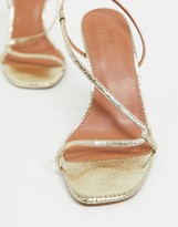 Thumbnail for your product : ASOS DESIGN Wide Fit Nevada strappy heeled sandals in gold snake
