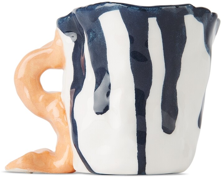 https://img.shopstyle-cdn.com/sim/db/a5/dba5d853084dacfd3617ebd58190874c_best/ottolinger-ssense-exclusive-white-blue-splatter-coffee-mug.jpg