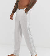 Thumbnail for your product : ASOS DESIGN lounge pyjama bottom in grey marl with side stripe and branded waistband