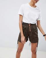 Thumbnail for your product : ASOS Design DESIGN parachute shorts with neon toggle