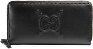 Gucci Embossed GG zip around wallet