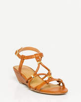 Thumbnail for your product : Le Château Studded Faux Leather Wedge Sandal