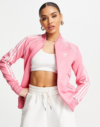 Maryanne Jones Okklusion Joke adidas adicolor three stripe track top in pink - ShopStyle Jackets