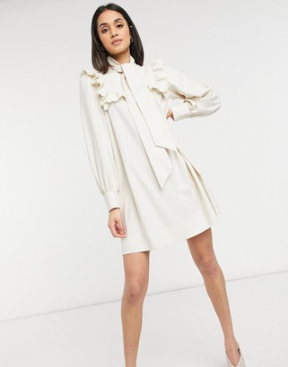 And other stories & smock mini dress with ruffle detail in cream