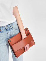Thumbnail for your product : Charles & Keith Grommet Flat Clutch