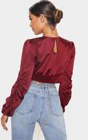 Thumbnail for your product : PrettyLittleThing Black Satin Ruched Long Sleeve Spilt Front Crop Blouse
