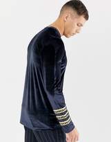 Thumbnail for your product : ASOS Design DESIGN longline long sleeve t-shirt with sleeve taping in velour in navy