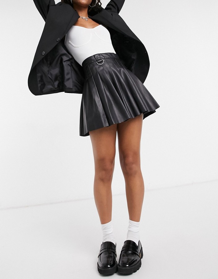 Bershka faux leather pleated mini tennis skirt in black - ShopStyle