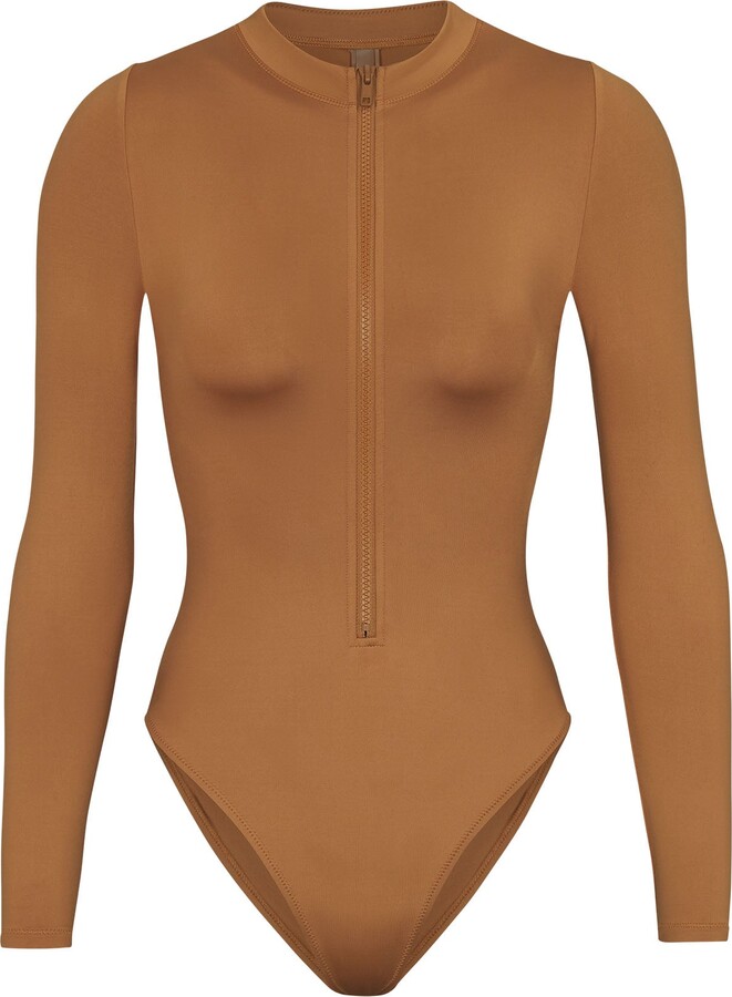 Swim Zip Front Long Sleeve One Piece Almond ShopStyle