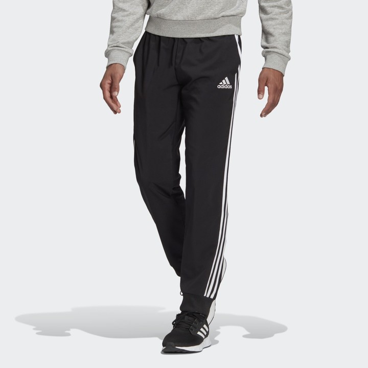 adidas AEROREADY Essentials Tapered-Cuff Woven 3-Stripes Pants - ShopStyle
