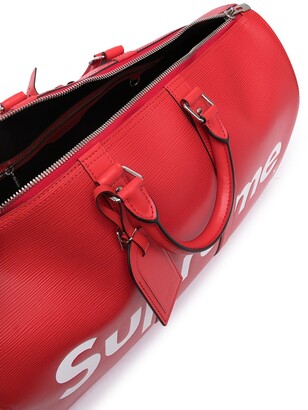 Louis Vuitton x Supreme 2017 pre-owned Epi Keepall Bandouliere Travel Bag -  Farfetch