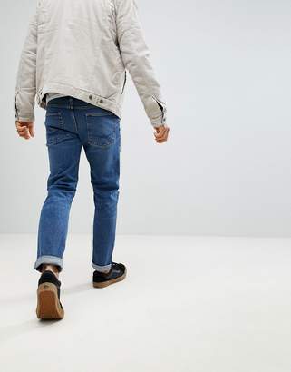 ASOS DESIGN Slim Jeans In Vintage Dark Wash With Knee Rips