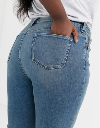 ASOS Curve DESIGN Curve high rise ridley 'skinny' jeans in pretty mid stonewash