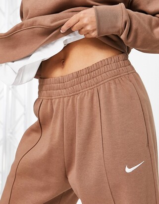 Nike Trend Fleece high waisted cuffed sweatpants in brown - ShopStyle  Activewear Pants
