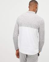 Thumbnail for your product : ASOS DESIGN long sleeve polo shirt with contrast yoke and pocket in interest fabric in white