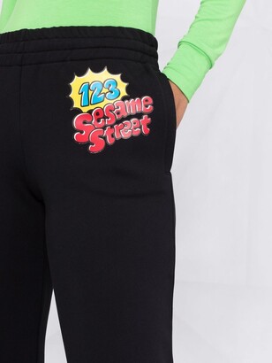 Moschino Sesame Street print track pants