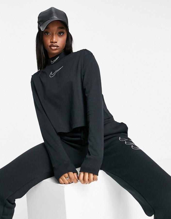 Nike Swoosh rhinestone applique cropped long sleeve mock neck top in black  - ShopStyle