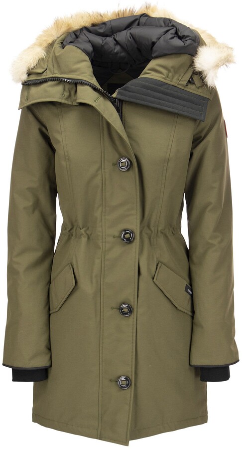 green coat with fur hood