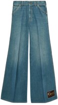 Thumbnail for your product : Gucci Stonewashed denim flare trousers