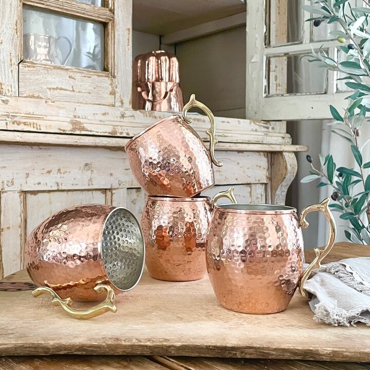 https://img.shopstyle-cdn.com/sim/df/4d/df4dcb45a0b616ba8300638cdd428f4f_best/coppermill-kitchen-vintage-inspired-moscow-mule-mugs.jpg