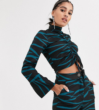 Another Reason high neck crop top with front rouching in teal zebra co-ord