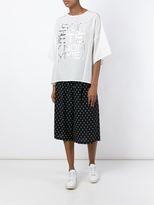Thumbnail for your product : Societe Anonyme printed wide leg knee shorts - women - Silk - 42