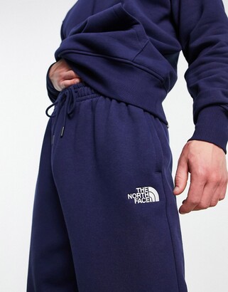 The North Face Oversized Essential sweatpants in navy Exclusive at ASOS -  ShopStyle Activewear Pants