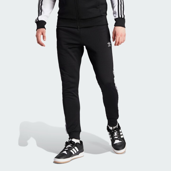 adidas Essentials Warm-Up Tapered 3-Stripes Track Pants - ShopStyle