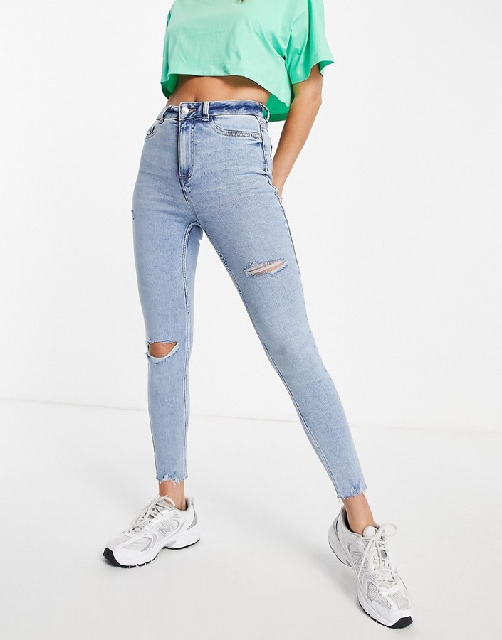 Light Blue Ripped Jeans Shop The World S Largest Collection Of Fashion Shopstyle