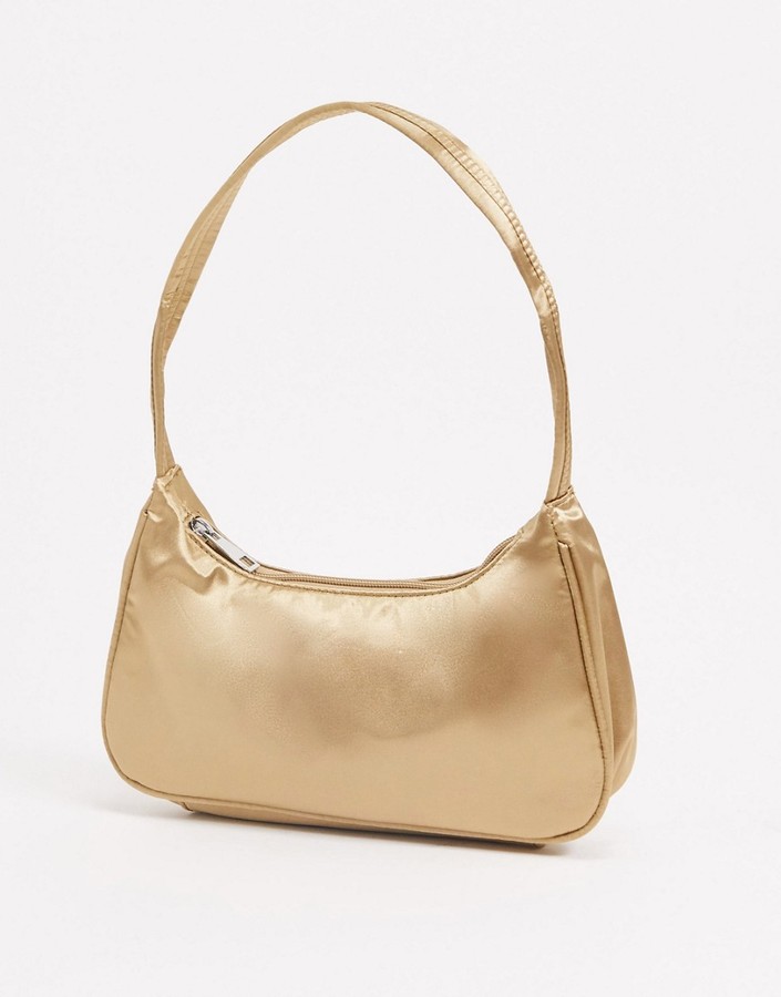ASOS DESIGN elongated 90s shoulder bag in champagne satin ShopStyle