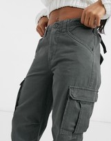 Thumbnail for your product : ASOS Petite DESIGN Petite cargo trousers with utility pocket in khaki