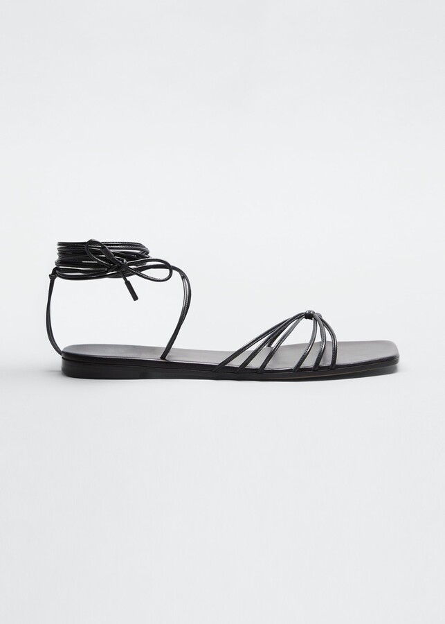 flat black strappy sandals