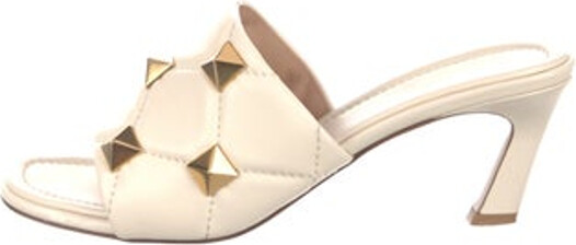 Valentino Leather Slides Neutrals & White Rockstud Accents Includes Box Unfortunately, due to restrictions, this item may not be eligible for shipping in all areas.